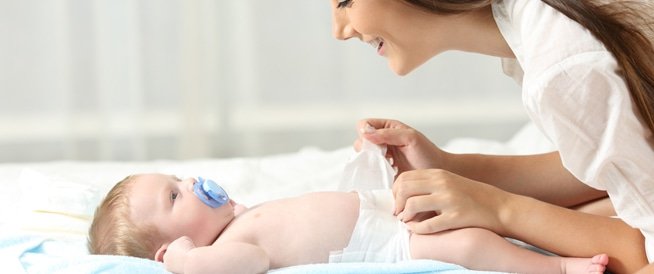 براز الرضيع أخضر مع أصفر